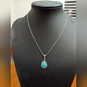 - Elegant Silver tone Necklace with Turquoise coloured Pendant. Chain is 1…